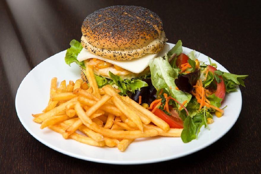 Hamburger menu with fries and salad