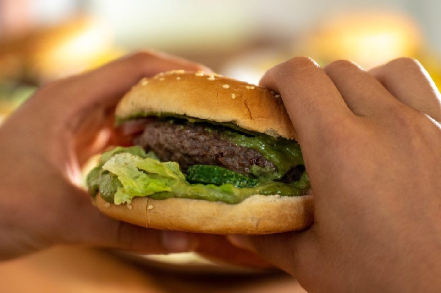 Delicious Hamburger ready to eat in the mouth.